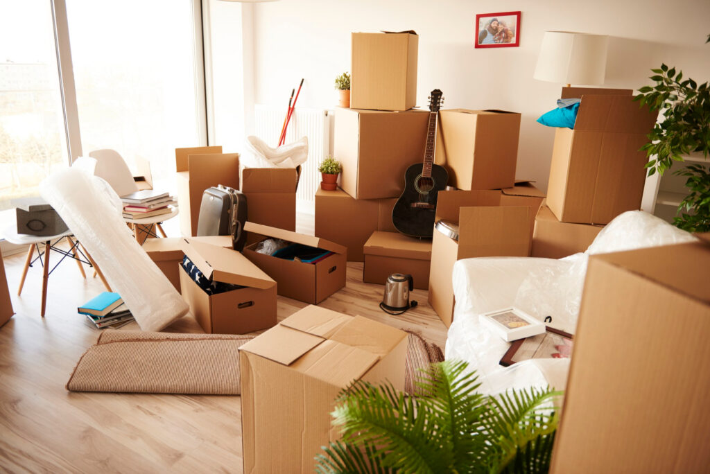 boxes-stacked-wooden-floor-new-house boxes-stacked-wooden-floor-new-house